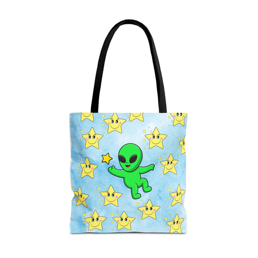 Blue AOP tote bag with yellow stars and green alien infront. 